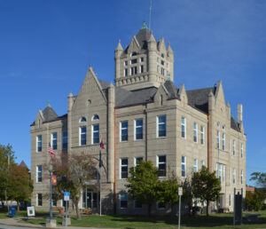 A large stone building of courthouse.